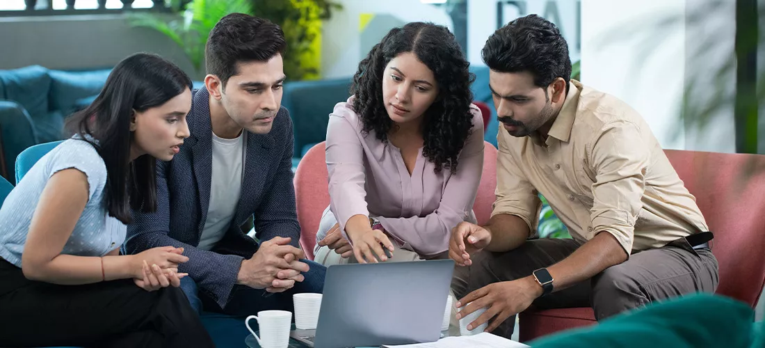 Team hands stacked in unity